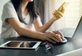 Hand woman holding credit card and using mobilephone for online shopping concept