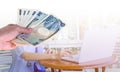 hand woman with Japanese currency yen bank notes on blurred back Royalty Free Stock Photo