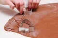 Hand of woman kneading dough for Christmas cookies Royalty Free Stock Photo