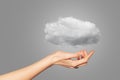 Hand of woman with light cloud - computing concept Royalty Free Stock Photo