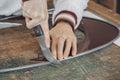 hand of woman master glassmaker at work