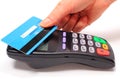 Hand of woman paying with contactless credit card, NFC technology Royalty Free Stock Photo