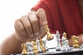Hand of woman playing chess for business tactic and planning met