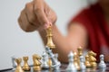 Hand of woman playing chess for business tactic and planning met