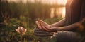 Hand of woman practicing meditation yoga in lotus position on nature sunset Royalty Free Stock Photo