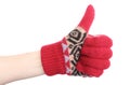 Hand of woman in red woolen glove showing thumbs up Royalty Free Stock Photo