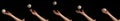 Hand of Woman Throwing a Ball of Baseball against Black Background Royalty Free Stock Photo