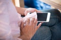 Hand of woman using shirt to clean smart phone screen technology lifestyle concept Royalty Free Stock Photo