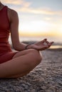 Hand, woman and yoga at the beach at sunset, zen and relax exercise, mudra and chakra training with mockup. Meditation Royalty Free Stock Photo