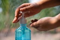 Hand women using alcohol gel