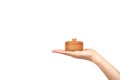 Hand with wooden container, round case. Isolated background Royalty Free Stock Photo