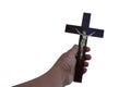 hand with a wooden cross with crucified Jesus Christ