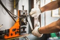 Hand of worker man , industrial bender equipment machine for me Royalty Free Stock Photo