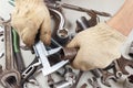 Hand of worker measure the part with calliper in the workshop Royalty Free Stock Photo