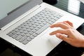 Hand of the worker He is using a computer Hands on the keyboard. Find the information on the internet at the corporate office. Royalty Free Stock Photo