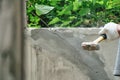 Hand of worker using hammer smashing and demolish on brick wall at construction site Royalty Free Stock Photo