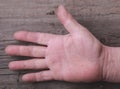 Hand worker on a wooden background