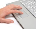 Hand working on a laptop touchpad Royalty Free Stock Photo