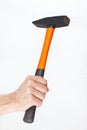 Hand of a workman holding a hammer on white background