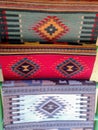 Hand-woven artisan traditional rugs for sale at an artisan shop in Mexico.