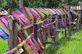 Hand woven clothes hang on wooden walkways in rice field at Sila Laeng, Pua District, Nan, Thailand Royalty Free Stock Photo