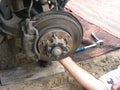 Hand with wrench. Auto mechanic. Close up Royalty Free Stock Photo