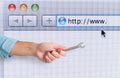 Hand with wrench over a internet web browser. concept of fix errors Royalty Free Stock Photo