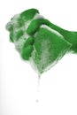 Hand wringing out sponge, close up Royalty Free Stock Photo