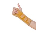 Hand with a wrist brace, orthopedic equipment isolated on white, insurance concept Royalty Free Stock Photo