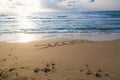 hand write success message on sand beach Royalty Free Stock Photo