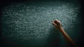 Hand Writing Complex Mathematical Formulas and Equations on a Chalkboard Royalty Free Stock Photo
