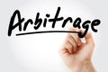 Hand writing Arbitrage with marker Royalty Free Stock Photo