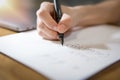 Hand writing with black fountain pen on white paper Royalty Free Stock Photo