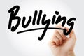 Hand writing Bullying with marker