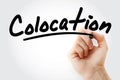 Hand writing Colocation with marker Royalty Free Stock Photo