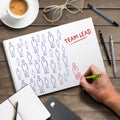 Hand writing concept of team leading on a college block Royalty Free Stock Photo