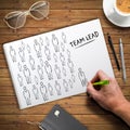 Hand writing concept of team leading on a college block Royalty Free Stock Photo