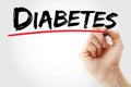 Hand writing Diabetes with marker, health concept background