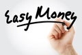 Hand writing Easy Money with marker Royalty Free Stock Photo