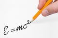 Hand writing formula on paper Royalty Free Stock Photo