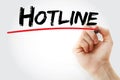 Hand writing Hotline with marker Royalty Free Stock Photo