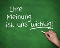 Hand writing Ihre meinung ist uns wichtig Royalty Free Stock Photo