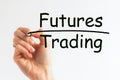 Hand writing inscription FUTURES TRADING with marker, concept, the letters in black, financial and trading concept