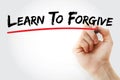 Hand writing Learn To Forgive with marker, concept background