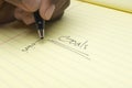 Hand Writing List Of goals On Notepad Royalty Free Stock Photo