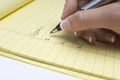 Hand Writing List Of Goals On Notepad Royalty Free Stock Photo