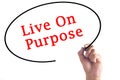 Hand writing Live On Purpose on transparent board Royalty Free Stock Photo