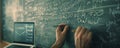 Hand writing math equations on a chalkboard Royalty Free Stock Photo