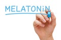 Hand Writing Melatonin With Blue Marker