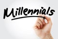 Hand writing Millennials text with marker